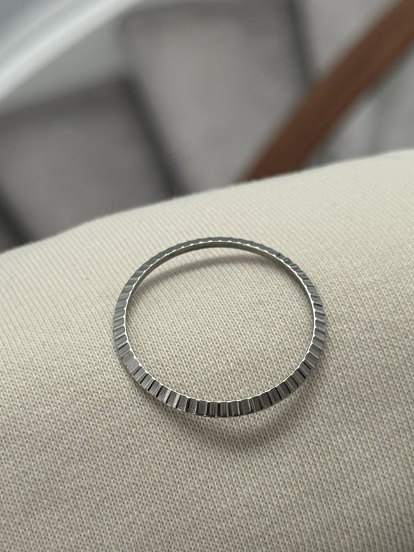 Genuine Engine turned 16030 bezel